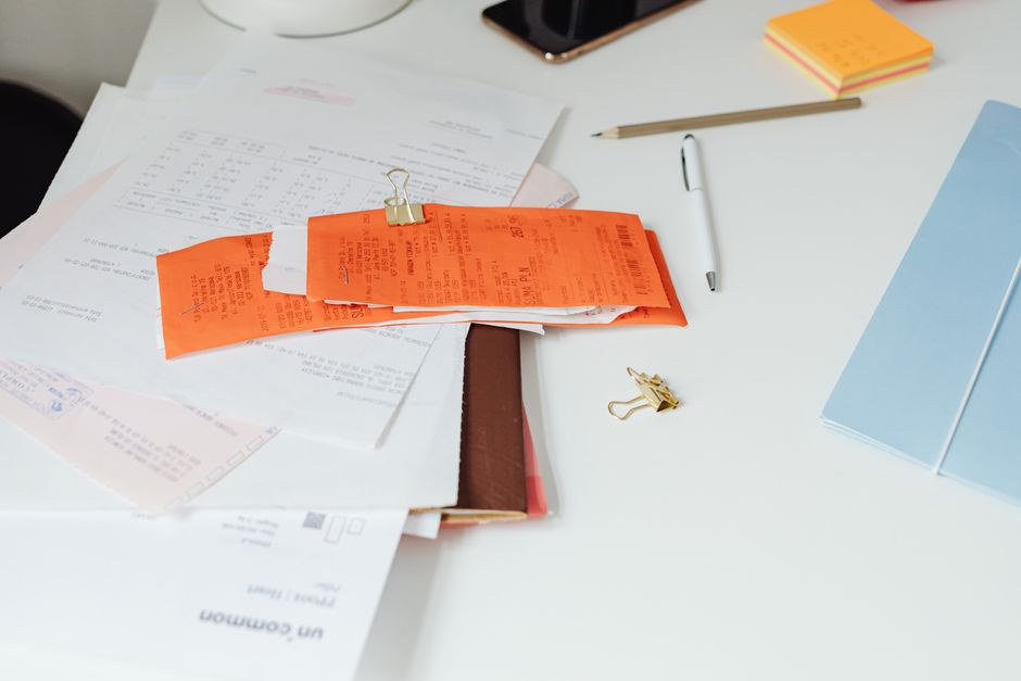 Invoices and receipts on a desk